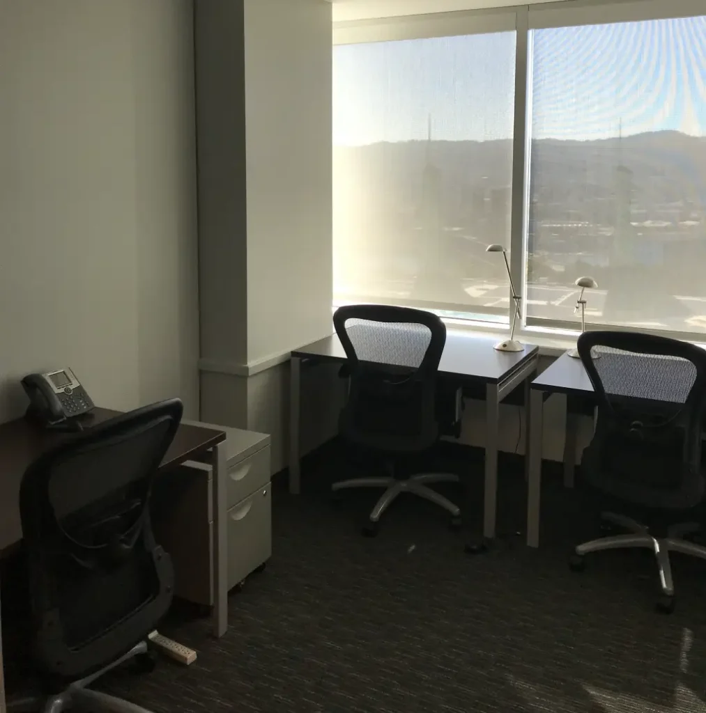 The original three-desk Oxalis office, with a view over the city