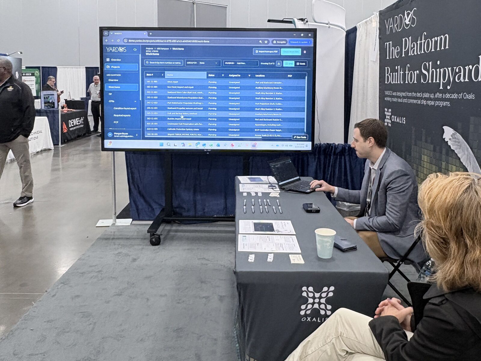 A live YARDOS demo showing ship repair work items on the booth screen at FMMS 2026
